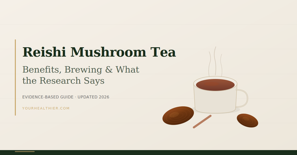 Ceramic cup of dark reddish-brown reishi mushroom tea with dried Ganoderma lucidum slices and subtle steam