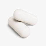 Magnesium glycinate capsules close-up for sleep and relaxation