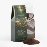 YourHealthier Mushroom Coffee bag angled view beside fresh ground coffee